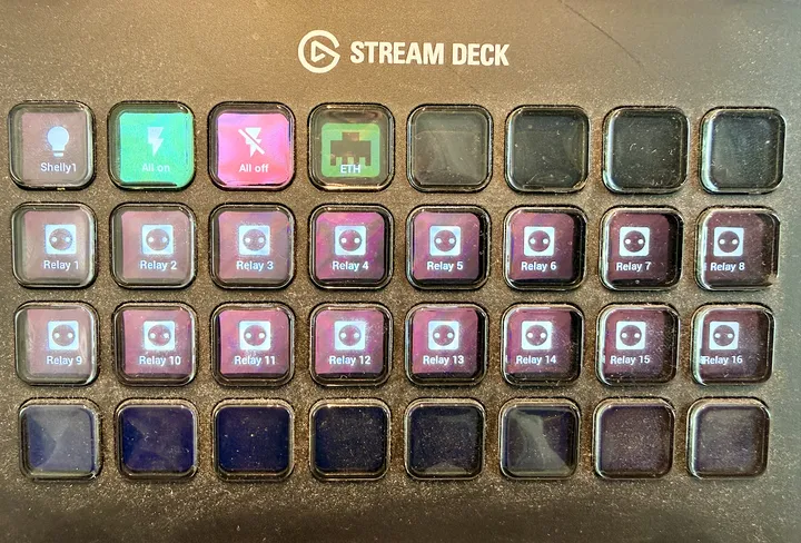 A Stream Deck with a top row of test buttons and two rows of buttons labelled Relay 1 to Relay 16
