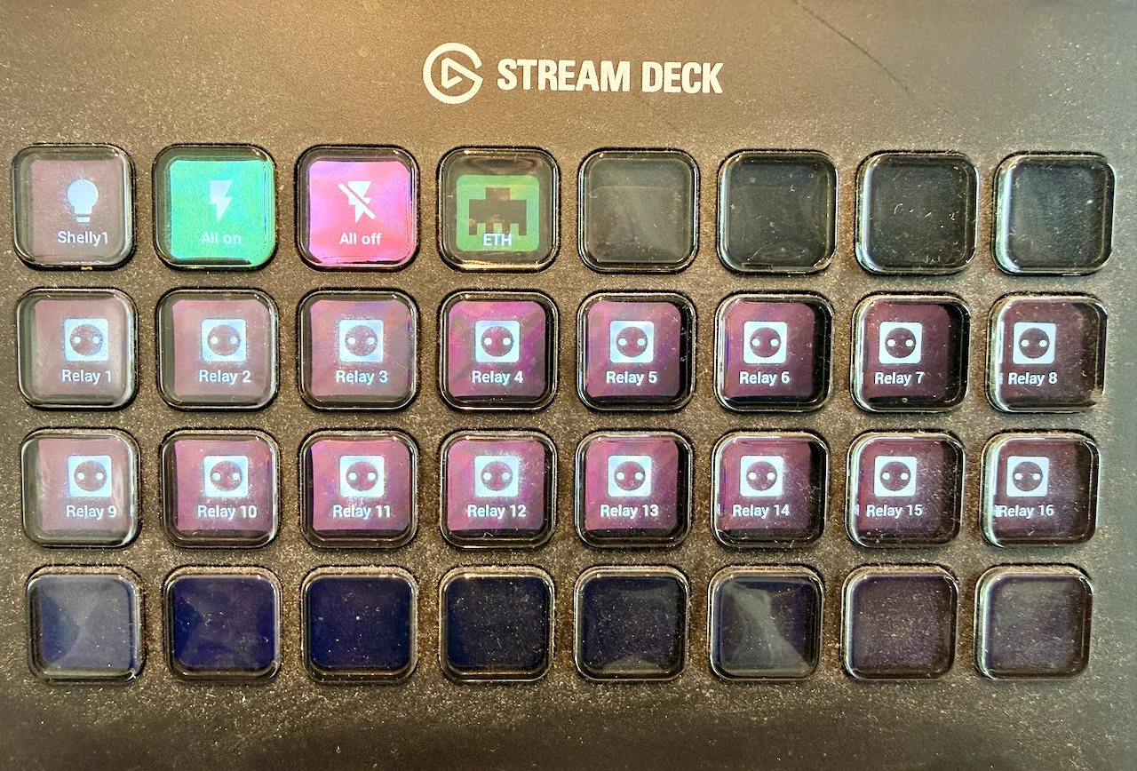 A Stream Deck with a top row of test buttons and two rows of buttons labelled Relay 1 to Relay 16